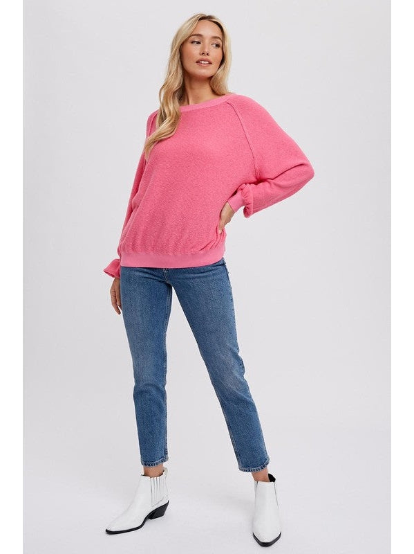 THE AMBER REVERSE SEAM BOUCLE PULLOVER TOP - pink